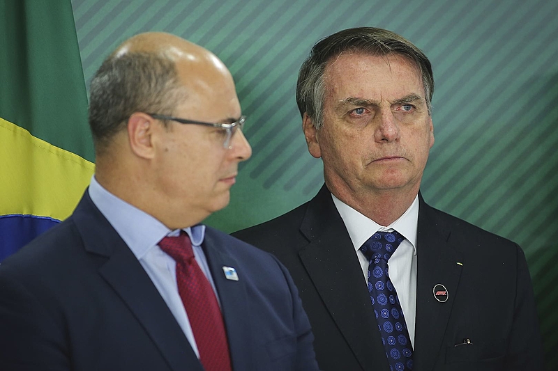JairBolsonaro-FlavioBolsonaro-WilsonWitzel-ChaseCarey-Formula1-Rio-24Jun2019