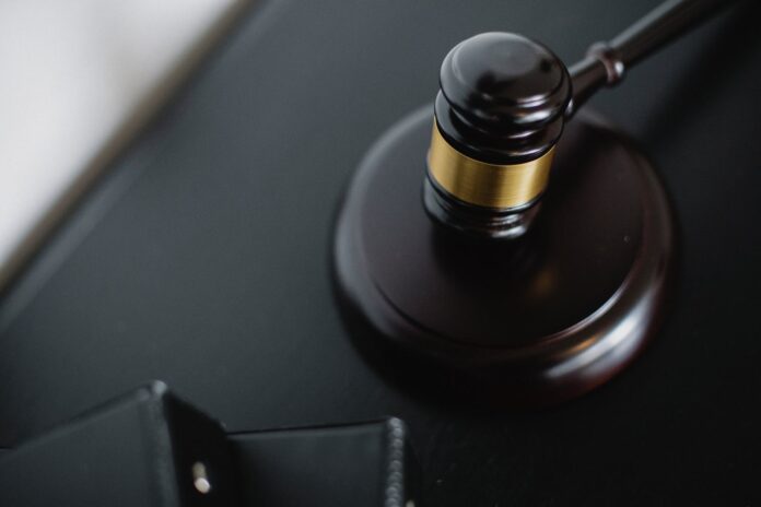 pexels-photo-5668481 close up photo of a wooden gavel