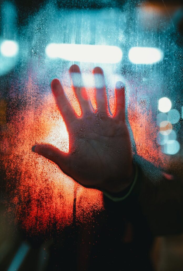 pexels-photo-3944752 hand touching glass