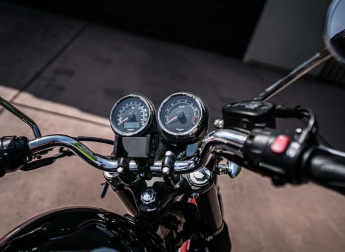 pexels-photo-5764941 motorcycle control panel with speedometer in daylight