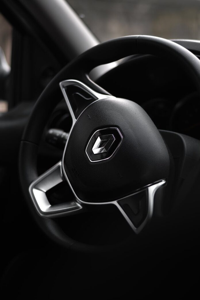 pexels-photo-10954004 close up photo of a black steering wheel