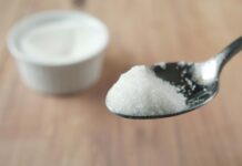 sugar in metal spoon