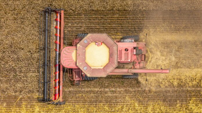 top view of a combine harvester in a field
