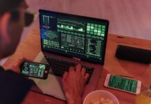 person using black tablet computer