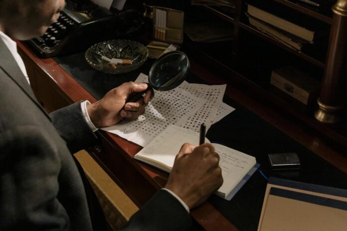 photo of detective decoding characters