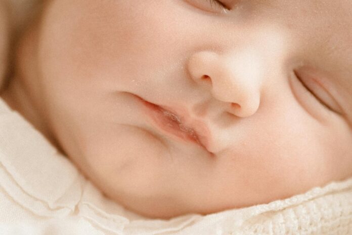 mouth of sleeping baby