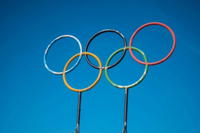 olympic rings against a clear blue sky