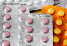 close up photo of pills on blister packs