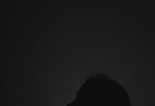 silhouette of person with dark background