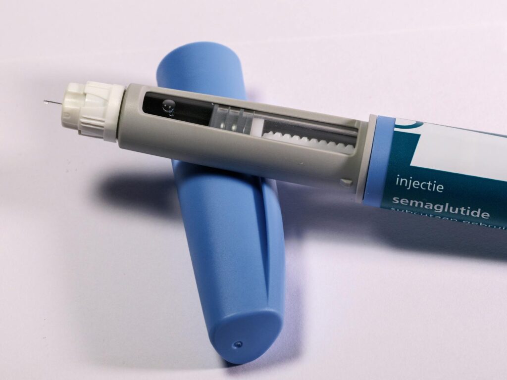 close up of semaglutide injection pen on surface