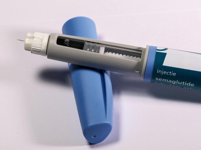 close up of semaglutide injection pen on surface
