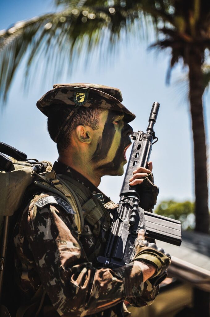 a man holding a rifle