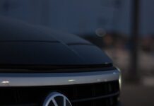 close up of the logo on the front of a volkswagen car