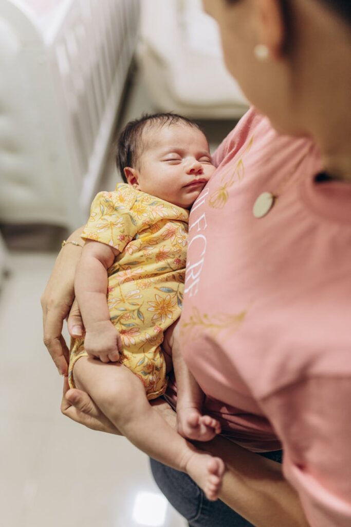 mother standing with baby