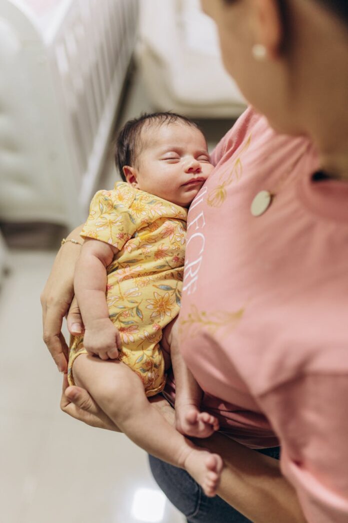 mother standing with baby