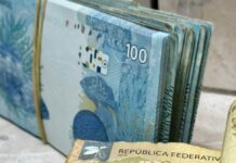 stacks of brazilian reais currency bills