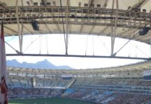 crowd enjoys soccer match at maracana stadium