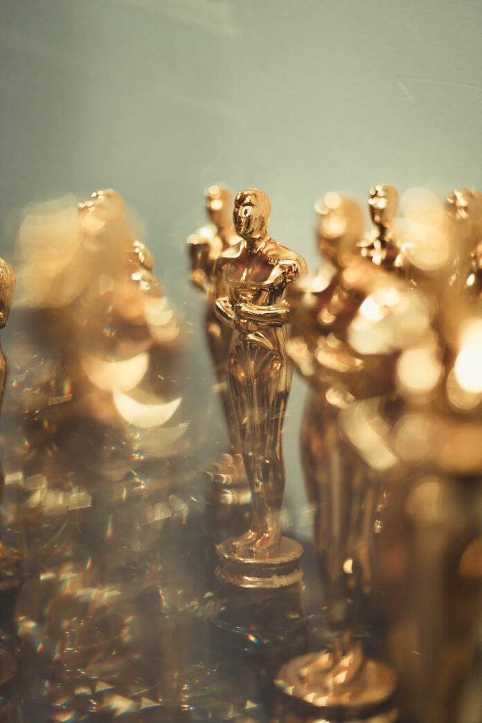 golden trophy statues at awards ceremony