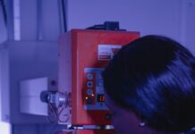 a woman operating a machine