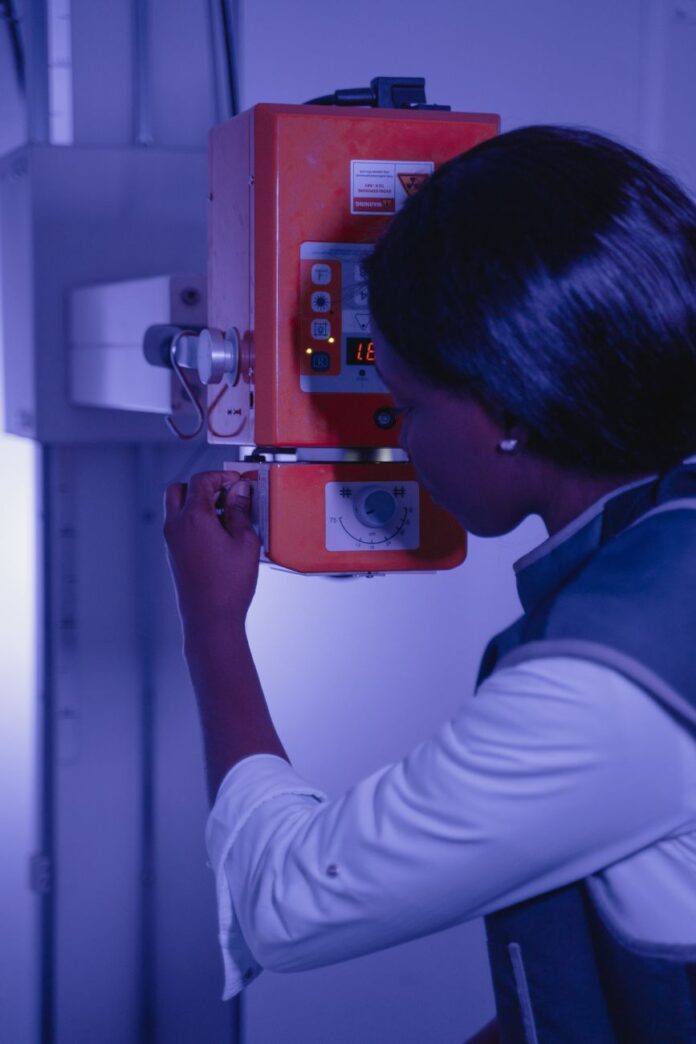 a woman operating a machine