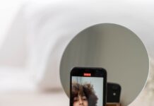 photo of woman on an iphone home screen