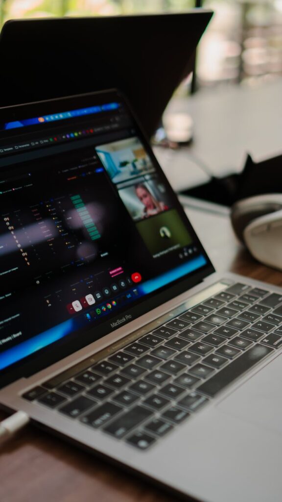 open laptop displaying video conference call